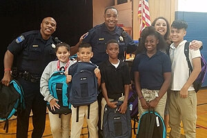 Graves McLain Delivers Free Backpacks to Every Student at Jackson Elementary School