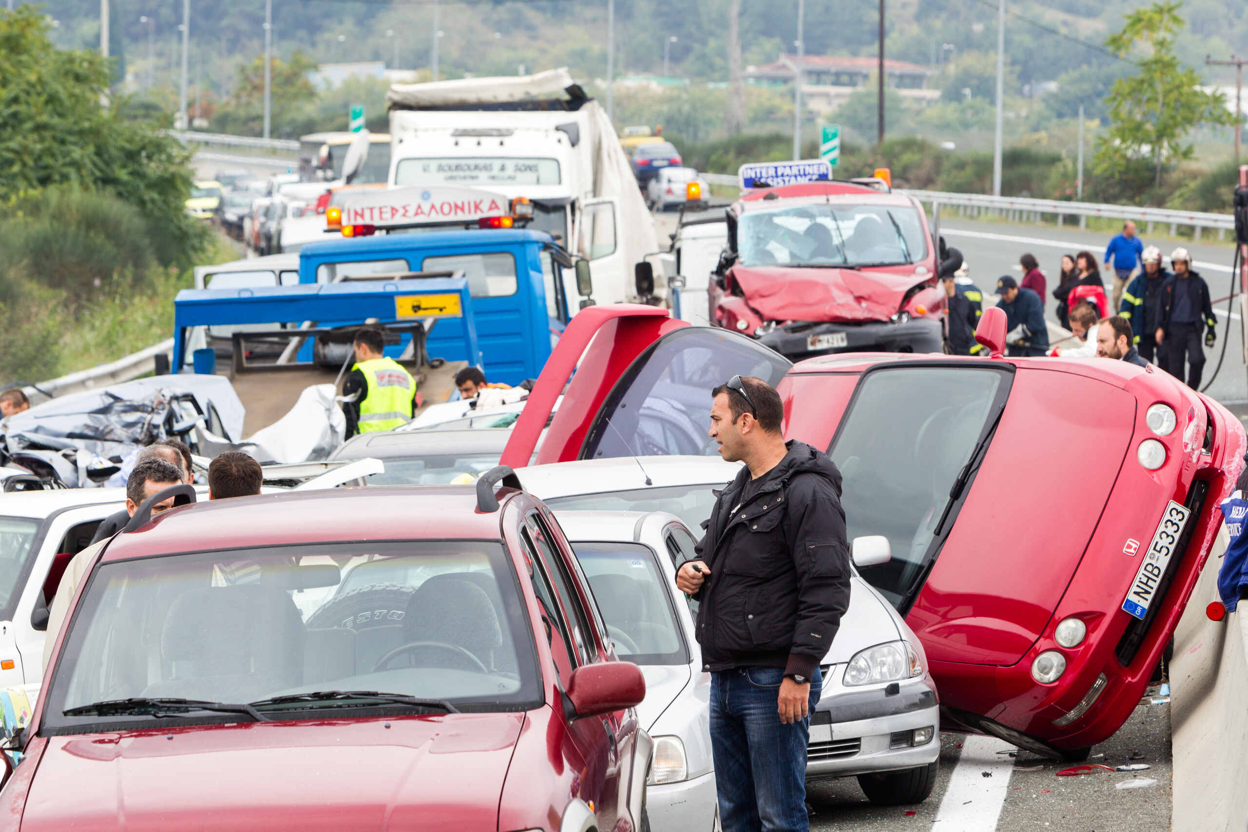 A massive multi-car pileup on an Oklahoma highway, illustrating how the 51% bar for modified comparative negligence is applied in chain-reaction crashes.