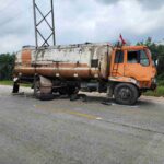 A heavy commercial vehicle transporting energy industry equipment on a Tulsa highway, where oil and gas truck accident liability often involves multiple corporate entities.