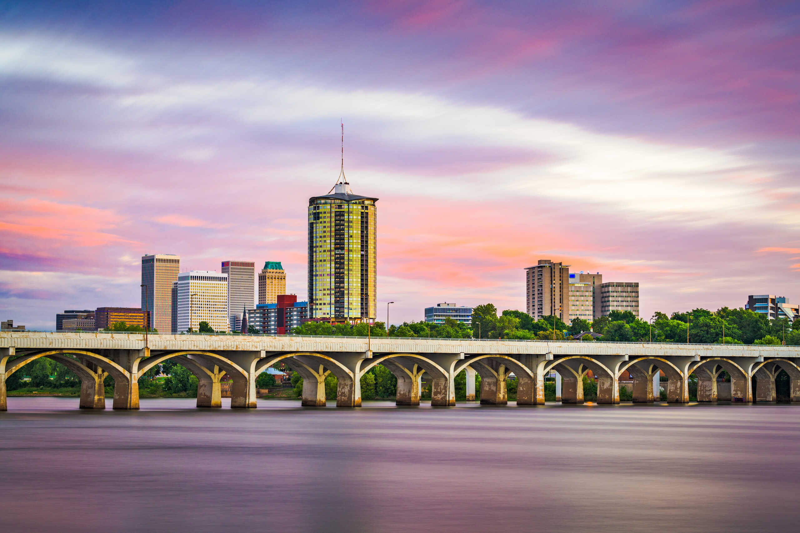 Tulsa skyline and bridge over the Arkansas River for Tulsa slip and fall lawyers.